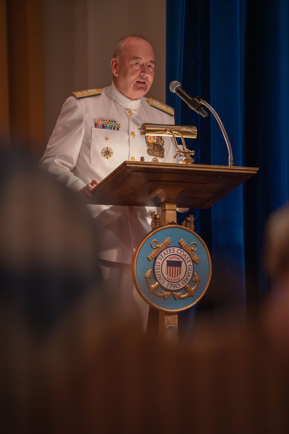 Coast Guard Rear Adm. Michael Day retires after 38 years of service