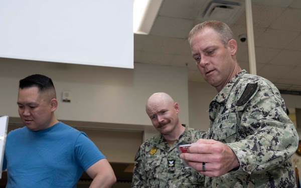 Chief Petty Officer selectees receive uniform fittings in Okinawa