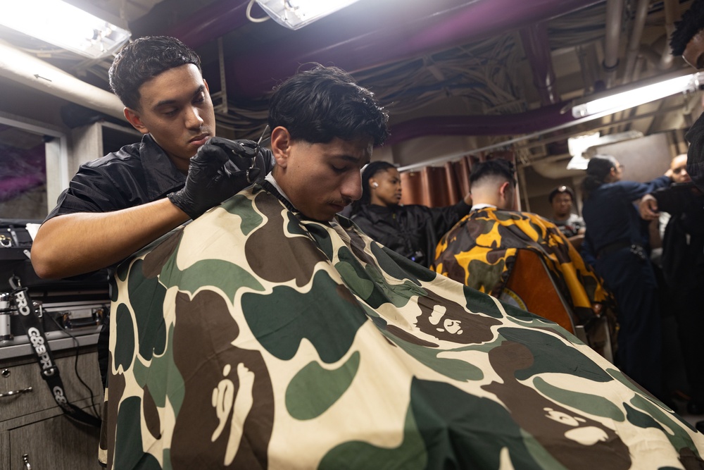 USS Gerald R. Ford (CVN 78) Sailors Participate in a Barber Competition