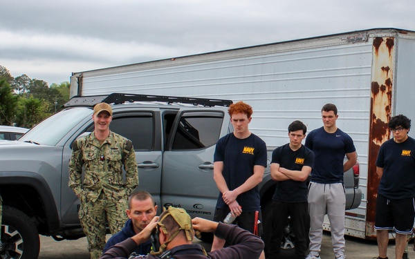 Fire Department Demonstrates Donning Fire Fighting Equipment