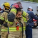 Delayed Entry Member Donning Fire Fighting Gear