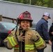 Delayed Entry Member Donning Fire Fighting Gear
