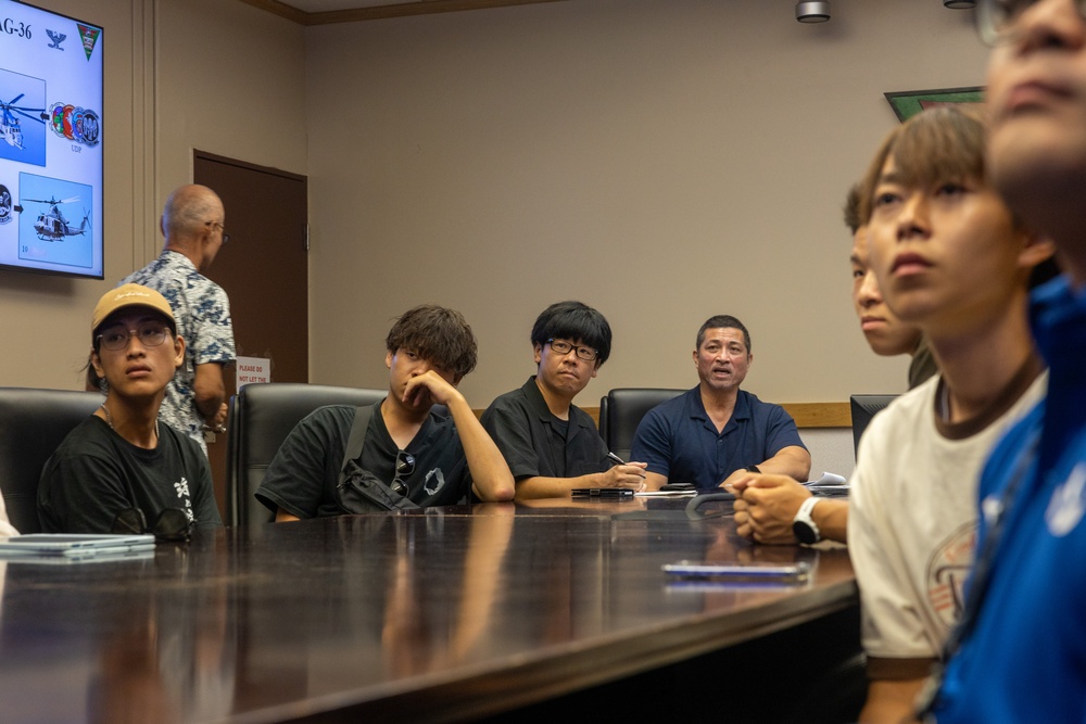 Osaka Sakai City International Youth Project students tour MCAS Futenma, MAG-36 aircraft