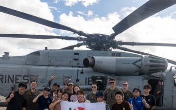 Osaka Sakai City International Youth Project students tour MCAS Futenma, MAG-36 aircraft