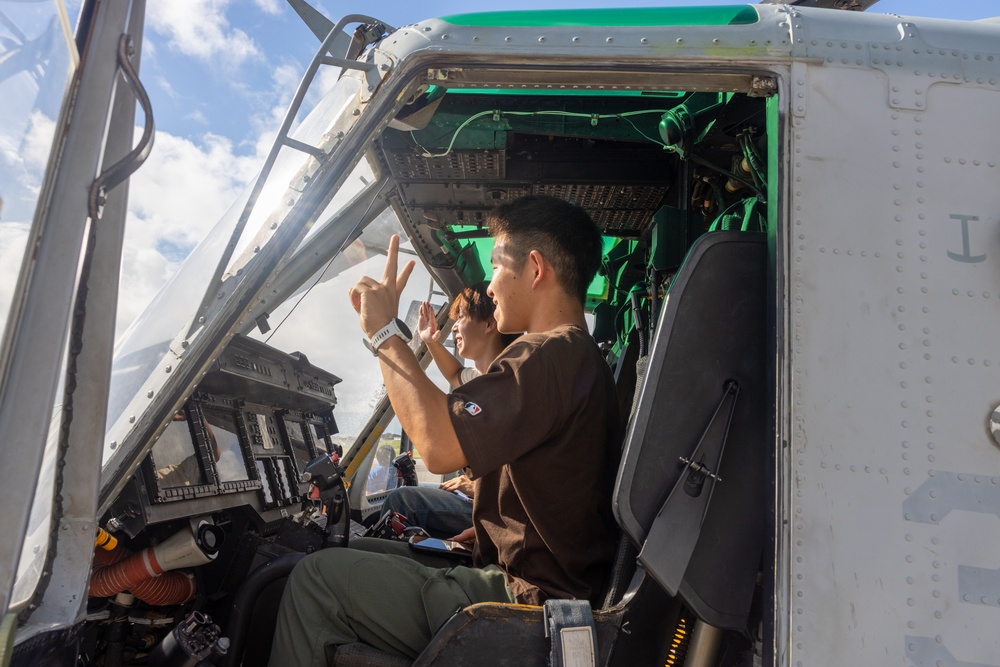 Osaka Sakai City International Youth Project students tour MCAS Futenma, MAG-36 aircraft