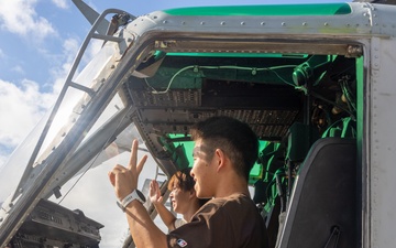 Osaka Sakai City International Youth Project students tour MCAS Futenma, MAG-36 aircraft
