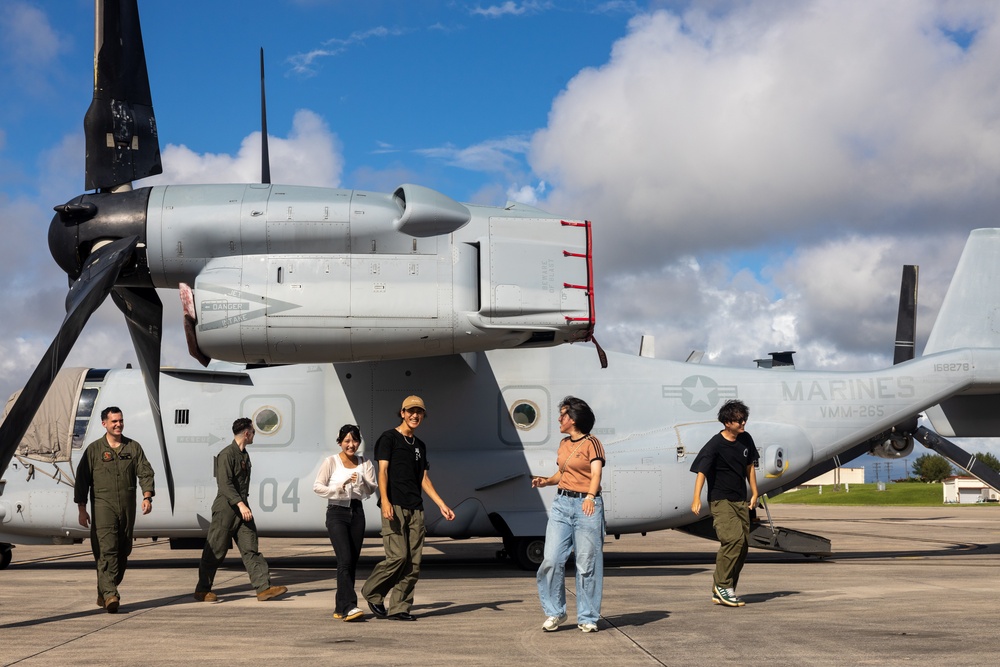 Osaka Sakai City International Youth Project students tour MCAS Futenma, MAG-36 aircraft