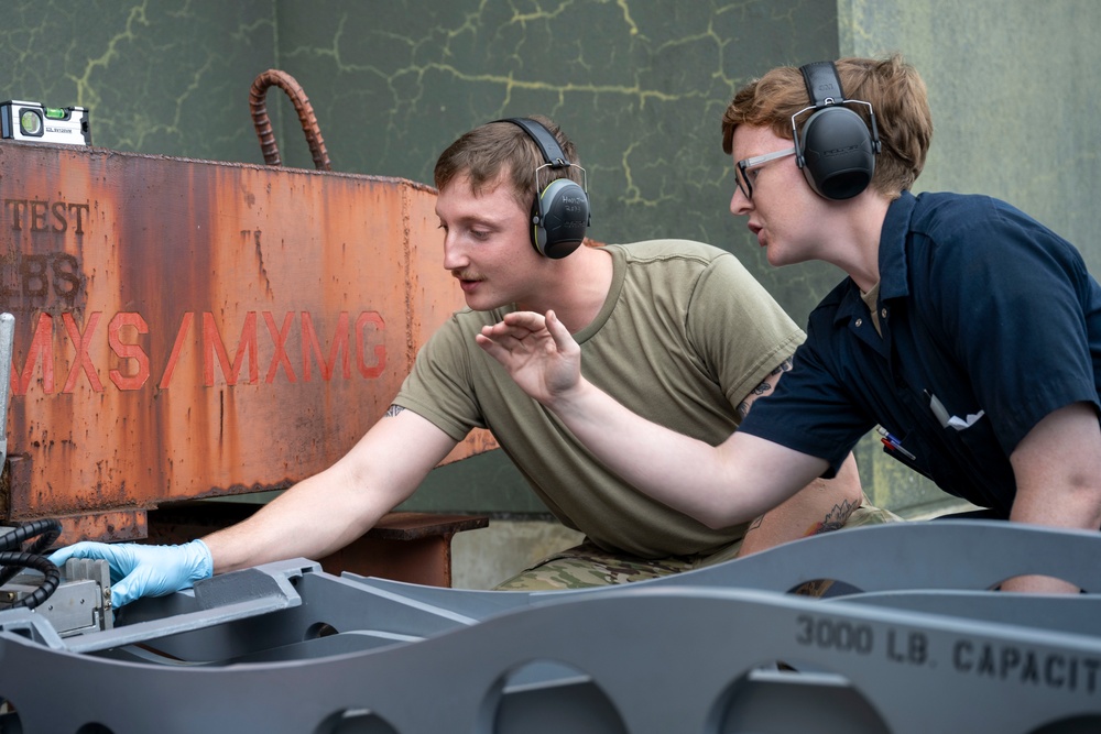 35th MXG and JASDF Airmen perform MJ-1 Bomb Lift Maintenance