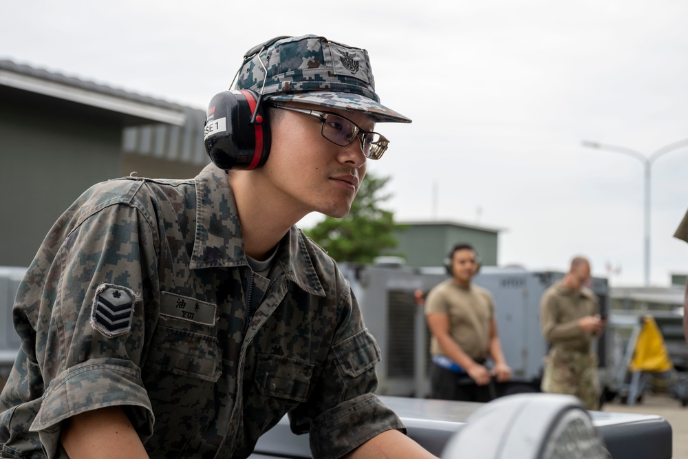 35th MXG and JASDF Airmen perform MJ-1 Bomb Lift Maintenance