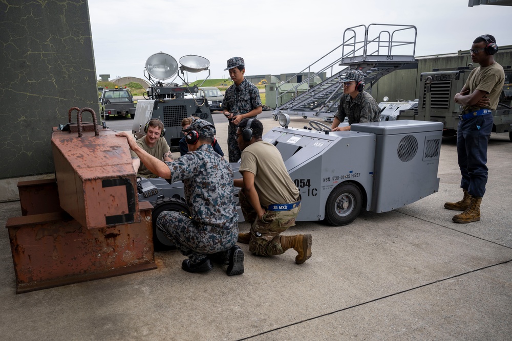 35th MXG and JASDF Airmen perform MJ-1 Bomb Lift Maintenance