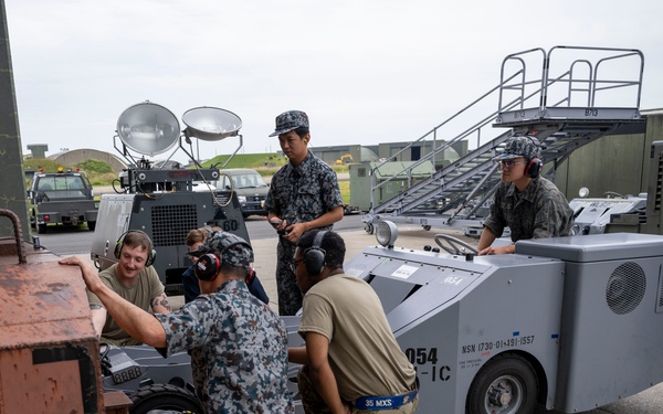 35th MXG and JASDF Airmen perform MJ-1 Bomb Lift Maintenance