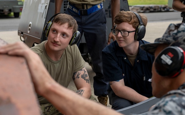 35th MXG and JASDF Airmen perform MJ-1 Bomb Lift Maintenance
