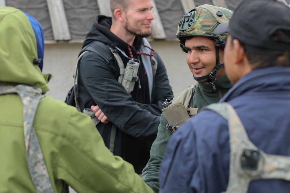 Training to Stabilize: Civil Affairs and PSYOP Key in Civilian Crisis Scenario at JMRC, Saber Junction 25