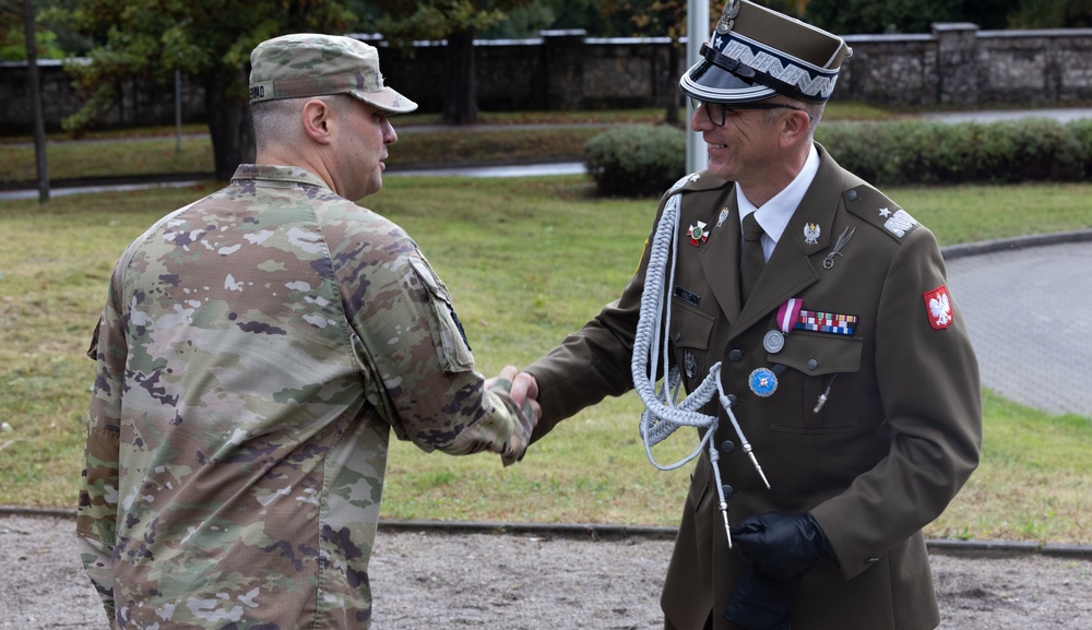 U.S. and Polish Leaders shake hands during the remembrance ceremony