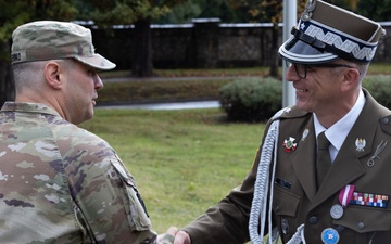 U.S. and Polish Leaders shake hands during the remembrance ceremony