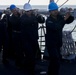 Sailors aboard the USS John Finn conduct a sea and anchor detail In Changi, Singapore