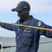 Sailors aboard the USS John Finn conduct a sea and anchor detail In Changi, Singapore