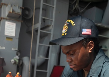 USS Tripoli Sailors Preform Maintenance