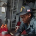 USS Tripoli Sailors Preform Maintenance