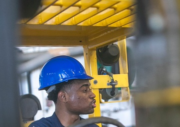 USS Tripoli Sailors Preform Maintenance