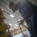 USS Tripoli Sailors Preform Maintenance