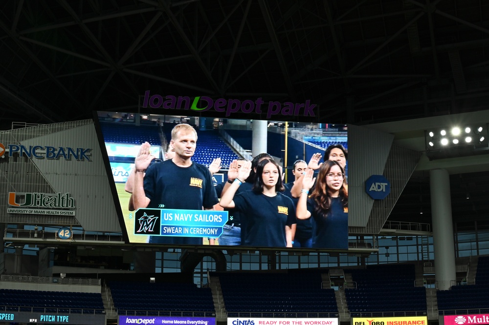 Ronald Reagan CO Swears In Future Sailors at Marlins’ 9/11 Game