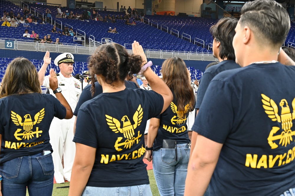 Ronald Reagan CO Swears In Future Sailors at Marlins’ 9/11 Game