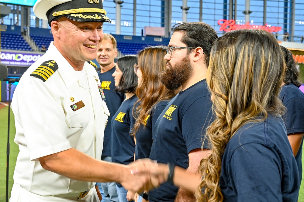 Ronald Reagan CO Swears In Future Sailors at Marlins’ 9/11 Game