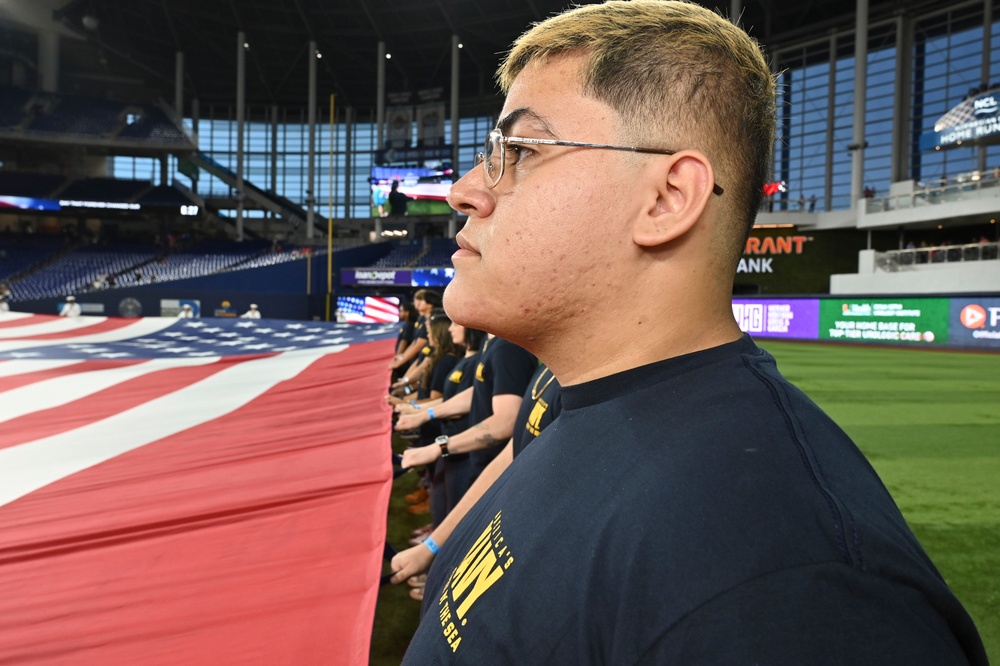 Ronald Reagan CO Swears In Future Sailors at Marlins’ 9/11 Game