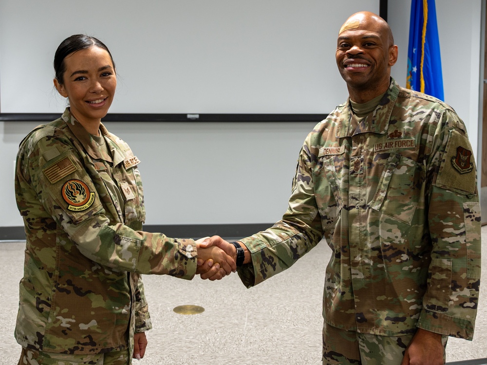 Oakies awarded for outstanding performance by the 4th AF commander and command chief