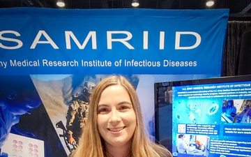 Research scientists share first-time experience, forge connections at military health symposium