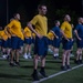 Sailors selected for chief petty officer PT with Rear Adm. Nash