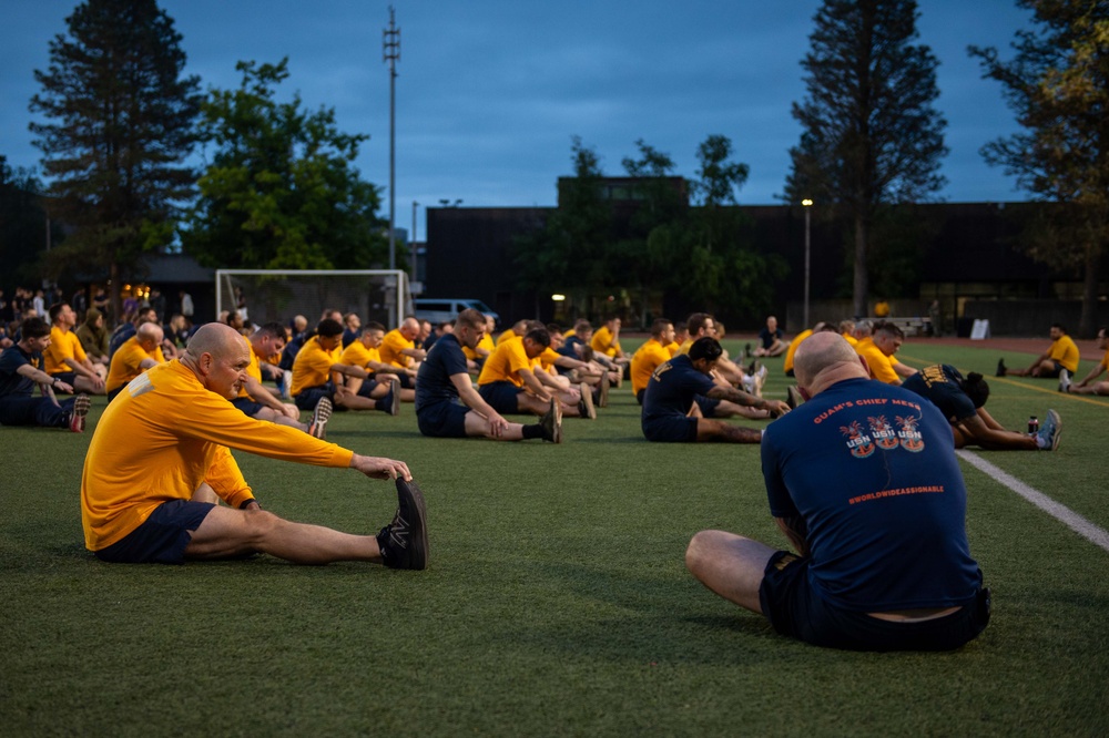 Sailors selected for chief petty officer PT with Rear Adm. Nash