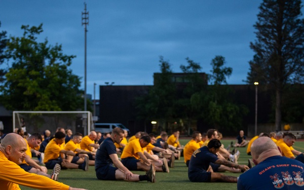 Sailors selected for chief petty officer PT with Rear Adm. Nash