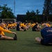 Sailors selected for chief petty officer PT with Rear Adm. Nash