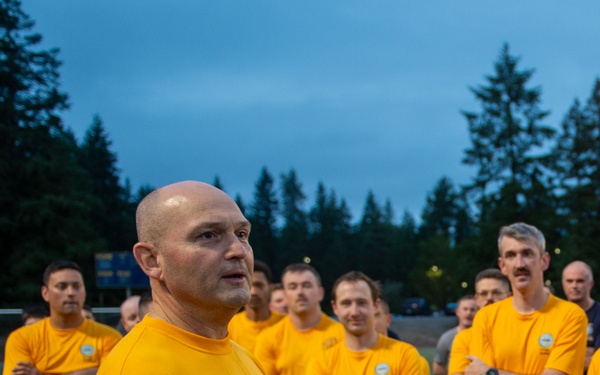 Sailors selected for chief petty officer PT with Rear Adm. Nash