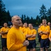 Sailors selected for chief petty officer PT with Rear Adm. Nash