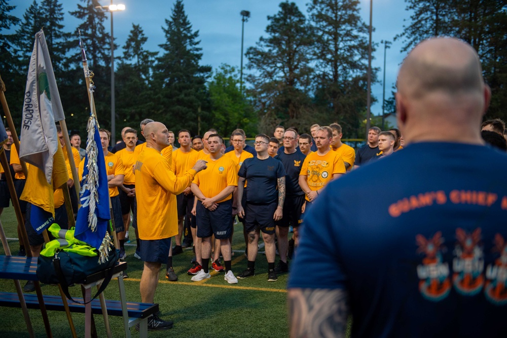Sailors selected for chief petty officer PT with Rear Adm. Nash
