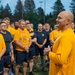 Sailors selected for chief petty officer PT with Rear Adm. Nash