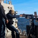 YN3 Alexander Quintero fires a .50-caliber machine gun during the Northern Coasts 2025
