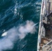 YN3 Alexander Quintero fires a .50-caliber machine gun during the Northern Coasts 2025