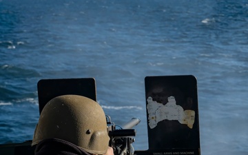 YN3 Alexander Quintero fires a .50-caliber machine gun during the Northern Coasts 2025