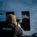YN3 Alexander Quintero fires a .50-caliber machine gun during the Northern Coasts 2025
