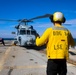 BM3 Carlens Milice and BM1 Jason Carpenter prepare an MH-60R Seahawk for take-off during the Northern Coasts 2025