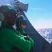AMAN Jeremiah Cobb and AM3 Emily Downs observe MH-60R Seahawk flight observations during the Northern Coasts 2025