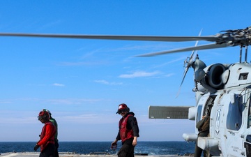 Sailors complete an MH-60R Seahawk pre-flight safety check during the Northern Coasts 2025