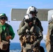 Sailors prepare for the departure of MH-60R Seahawk during the Northern Coasts 2025