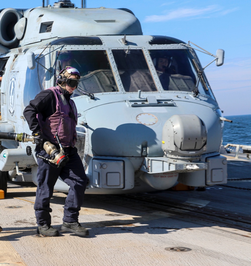 GSM2 Mark Bacca  conducts a hot-pump refueling operation during the Northern Coasts 2025