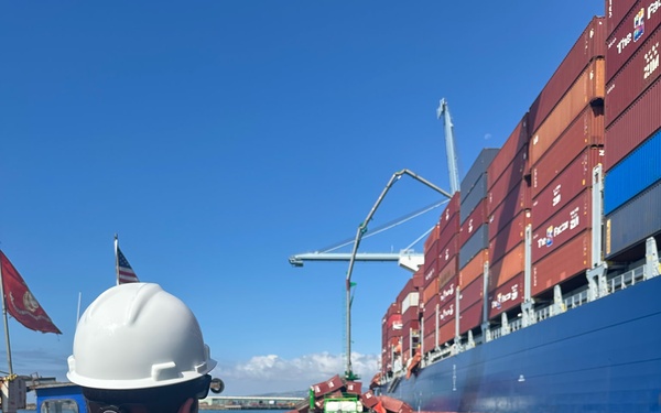U.S Coast Guard Salvage Engineering Response Team surveys the container ship in the Port of Long Beach
