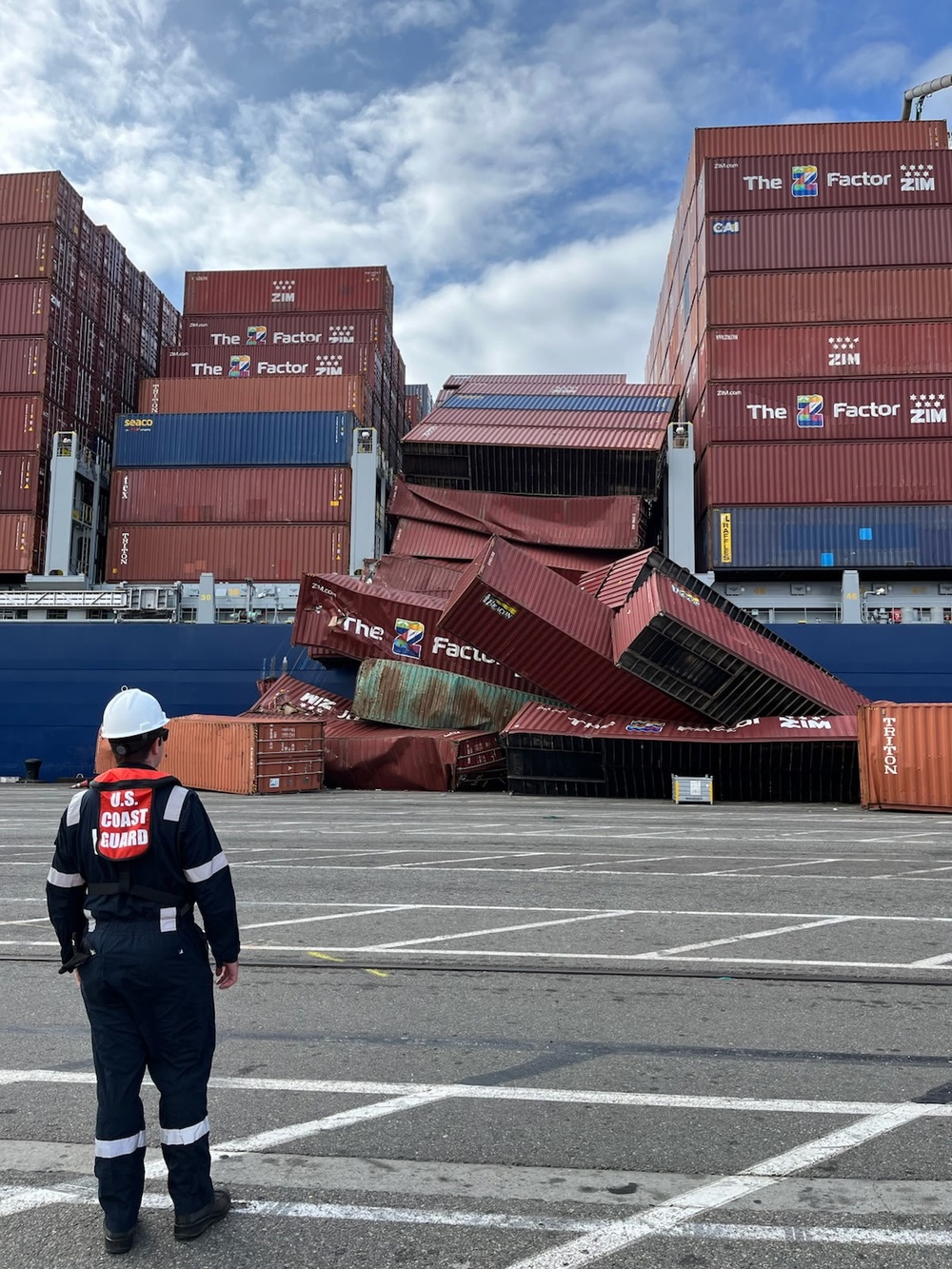 U.S Coast Guard Salvage Engineering Response Team surveys the container ship in the Port of Long Beach